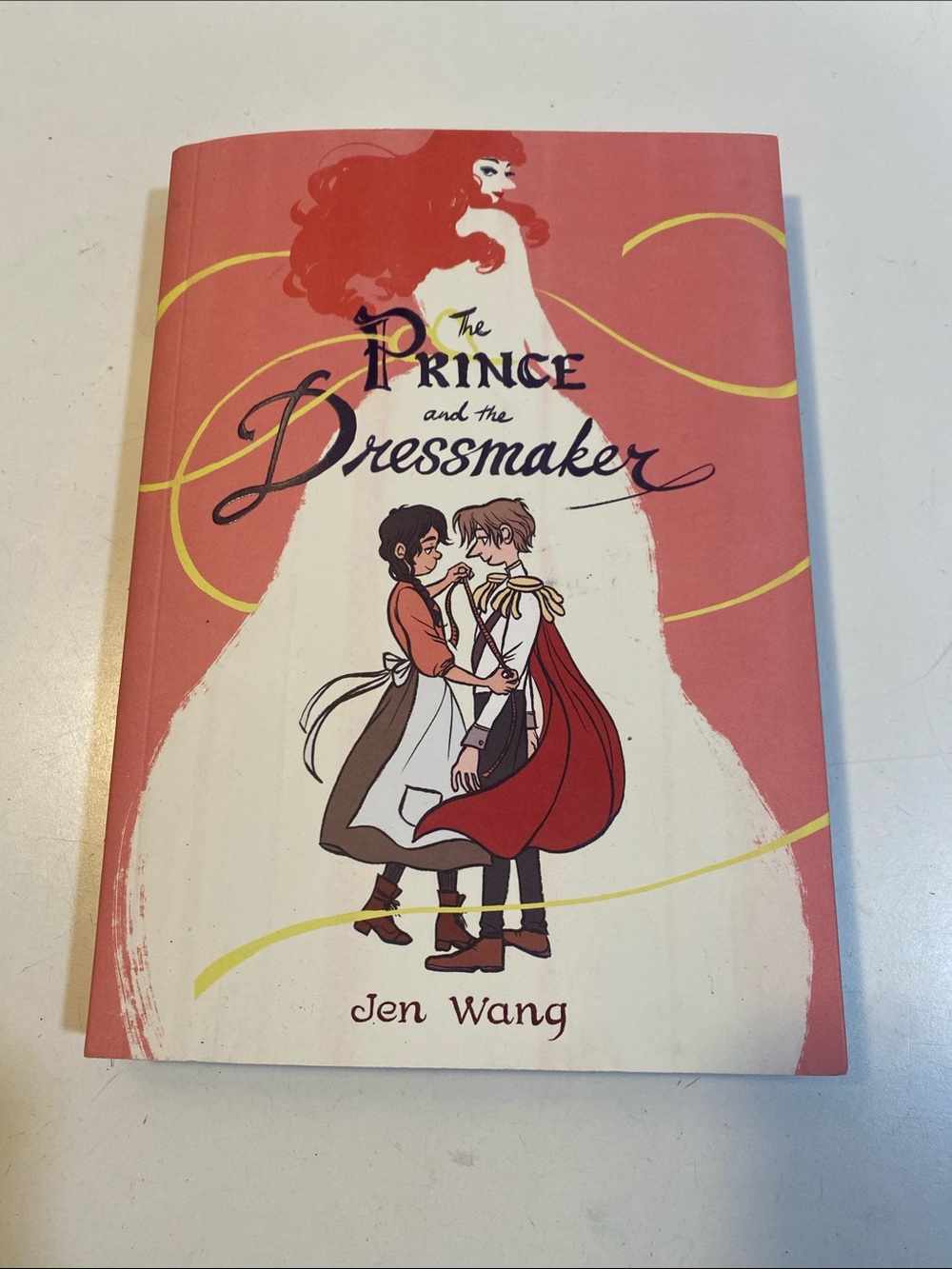 The Prince and the Dressmaker by Jen Wang - Coral & Cream Cover